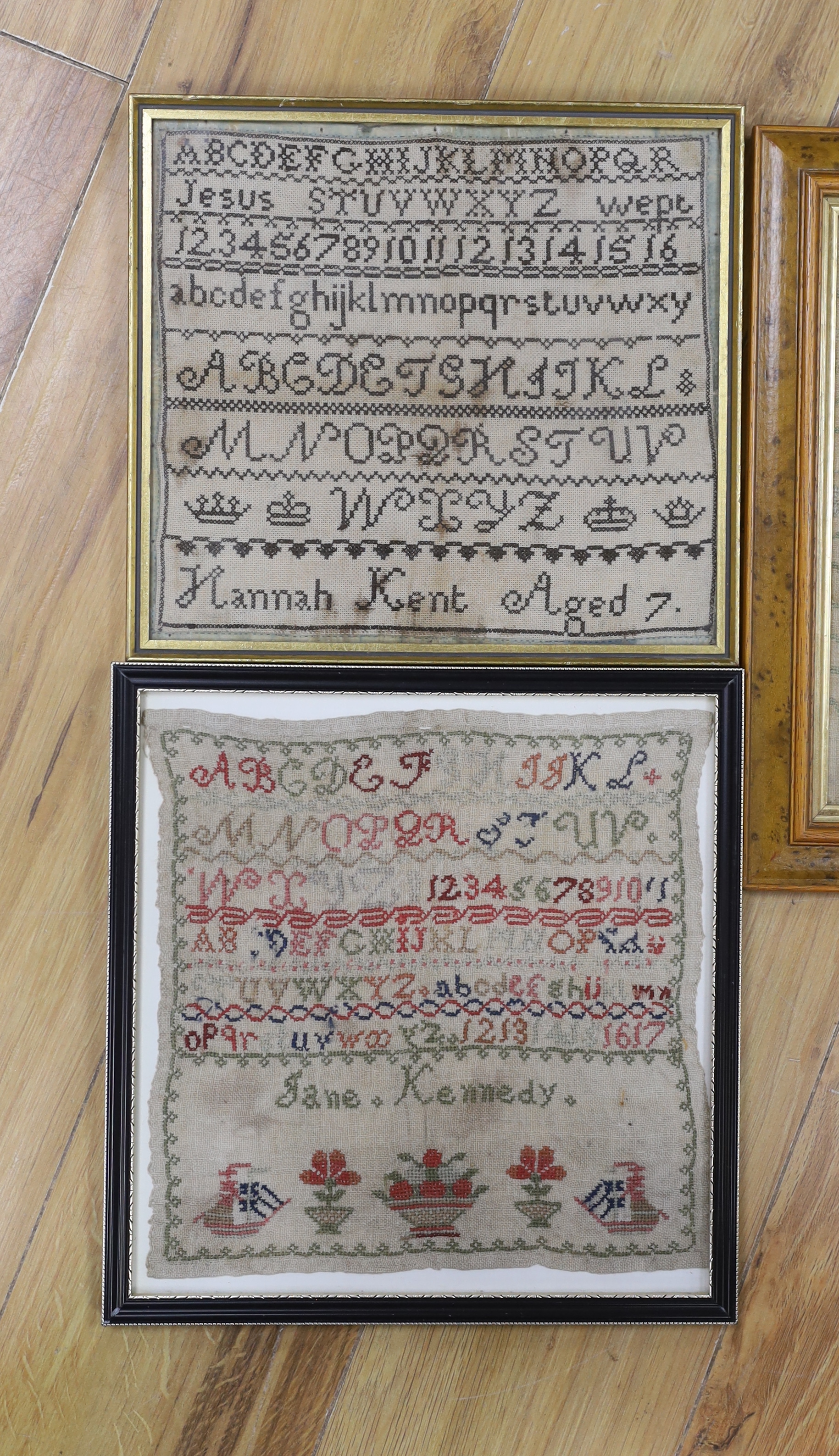 A George III dated 1797 framed alphabet sampler, by Barbara Darling and two similar dated samplers 1825 and 1828 by Elizabeth Kidd, together with a later undated 19th century sampler by Jane Kennedy (4)